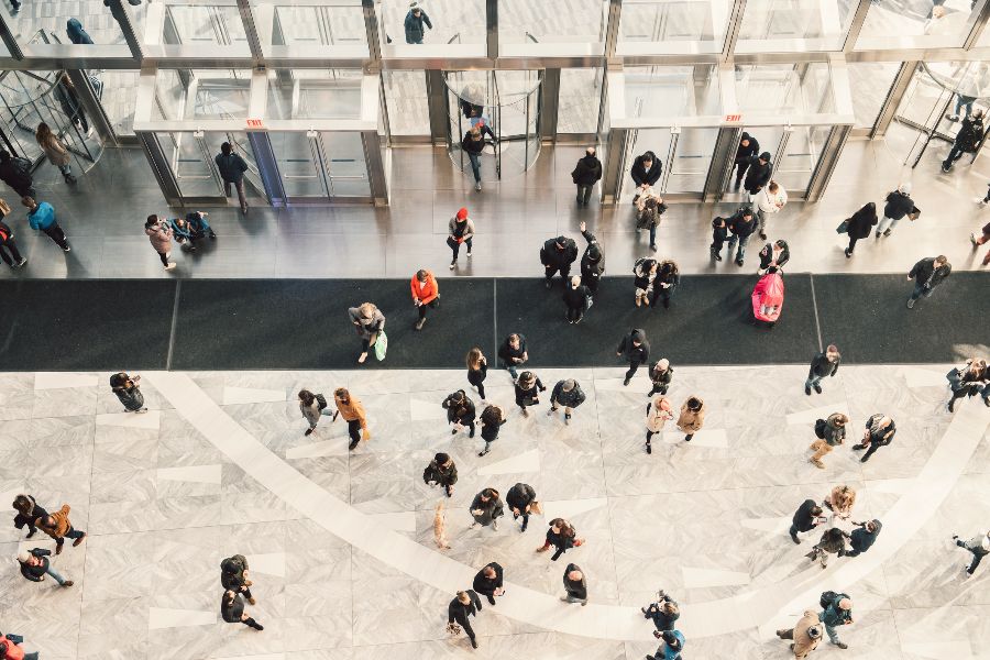 People in the atrium of a building, seen from above